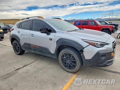 Czwarte zdjęcie samochodu z boku: 2024 SUBARU CROSSTREK WILDERNESS VIN:4S4GUHU65R3842520 - miniatura