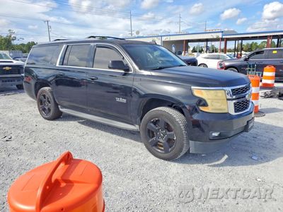 Czwarte zdjęcie samochodu z boku: 2015 CHEVROLET SUBURBAN C1500 LT VIN:1GNSCJKC5FR729054 - miniatura