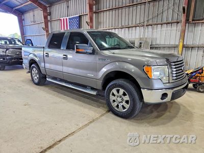 Czwarte zdjęcie samochodu z boku: 2011 FORD F150 SUPERCREW VIN:1FTFW1CT3BFA56549 - miniatura