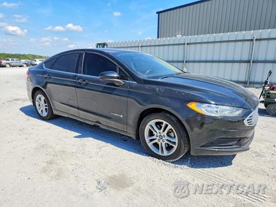 Czwarte zdjęcie samochodu z boku: 2018 FORD FUSION SE HYBRID VIN:3FA6P0LU9JR274275 - miniatura
