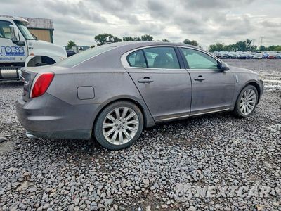 Trzecie zdjęcie samochodu z tyłu: 2012 LINCOLN MKS VIN:1LNHL9FT9CG805843 - miniatura
