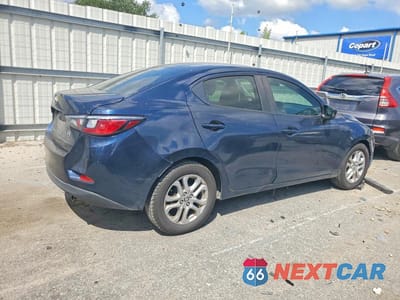 Trzecie zdjęcie samochodu z tyłu: 2018 TOYOTA YARIS IA BASE VIN:3MYDLBYV7JY312877 - miniatura