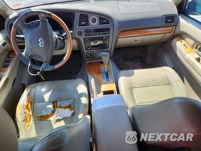 Zdjęcie 8 z 13 samochodu: 2002 INFINITI QX4 BASE VIN:JNRDR09Y12W259676 - miniatura