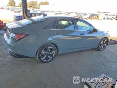 Trzecie zdjęcie samochodu z tyłu: 2021 HYUNDAI ELANTRA LIMITED VIN:KMHLN4AJ5MU008490 - miniatura