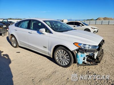 Czwarte zdjęcie samochodu z boku: 2016 FORD FUSION SE PHEV VIN:3FA6P0PU0GR270540 - miniatura