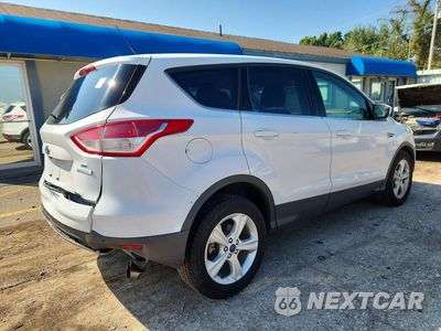 Trzecie zdjęcie samochodu z tyłu: 2014 FORD ESCAPE SE VIN:1FMCU0G99EUD45593 - miniatura
