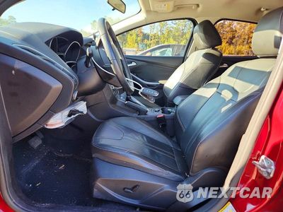 Zdjęcie 7 z 12 samochodu: 2014 FORD FOCUS TITANIUM VIN:1FADP3N23EL422459 - miniatura