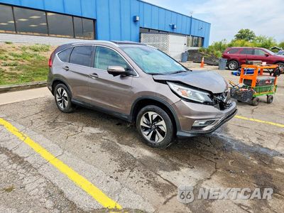 Czwarte zdjęcie samochodu z boku: 2016 HONDA CR-V TOURING VIN:5J6RM4H97GL039399 - miniatura