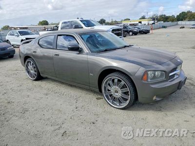 Czwarte zdjęcie samochodu z boku: 2009 DODGE CHARGER SXT VIN:2B3KA33V69H622191 - miniatura