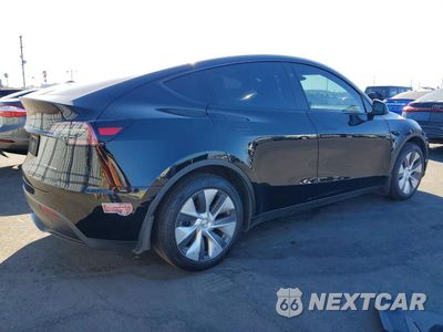 Trzecie zdjęcie samochodu z tyłu: 2023 TESLA MODEL Y VIN:7SAYGDEE4PA177365 - miniatura