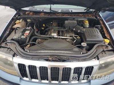 Zdjęcie 12 z 13 samochodu: 2002 JEEP GRAND CHEROKEE LAREDO VIN:1J4GW48S32C254646 - miniatura
