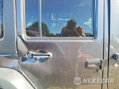 Zdjęcie 10 z 12 samochodu: 2018 JEEP WRANGLER UNLIMITED SPORT VIN:1C4BJWDG3JL882412 - miniatura