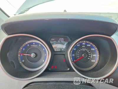 Zdjęcie 9 z 12 samochodu: 2013 HYUNDAI ELANTRA GLS VIN:KMHDH4AEXDU811519 - miniatura
