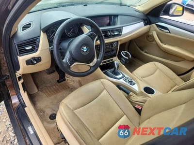 Zdjęcie 8 z 13 samochodu: 2013 BMW X1 SDRIVE28I VIN:WBAVM1C51DVW46225 - miniatura