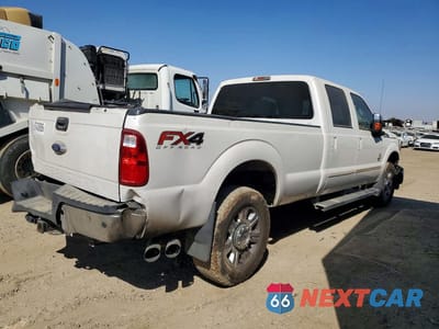 Trzecie zdjęcie samochodu z tyłu: 2014 FORD F350 SUPER DUTY VIN:1FT8W3BT4EEA67026 - miniatura