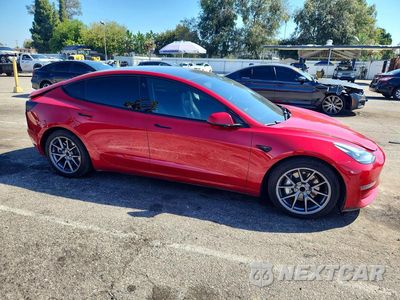 Czwarte zdjęcie samochodu z boku: 2022 TESLA MODEL 3 VIN:5YJ3E1EAXNF191909 - miniatura