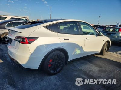 Trzecie zdjęcie samochodu z tyłu: 2021 TESLA MODEL Y VIN:5YJYGDEF0MF124487 - miniatura