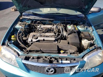 Zdjęcie 11 z 12 samochodu: 2001 MAZDA PROTEGE DX VIN:JM1BJ222810440405 - miniatura