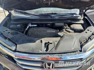 Zdjęcie 12 z 13 samochodu: 2016 HONDA PILOT EXL VIN:5FNYF5H55GB037930 - miniatura