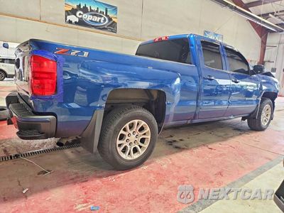 Trzecie zdjęcie samochodu z tyłu: 2018 CHEVROLET SILVERADO K1500 LT VIN:2GCVKREC2J1112876 - miniatura