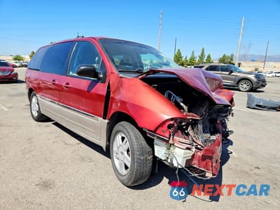 Czwarte zdjęcie samochodu z boku: 2002 FORD WINDSTAR SEL VIN:2FMDA53452BA85750 - miniatura