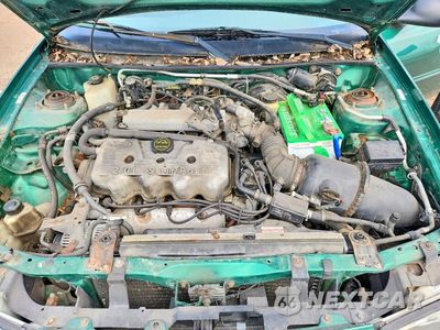 Zdjęcie 11 z 12 samochodu: 2002 FORD ESCORT VIN:3FAFP13P12R193109 - miniatura