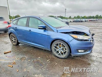 Czwarte zdjęcie samochodu z boku: 2018 FORD FOCUS SEL VIN:1FADP3M26JL319757 - miniatura