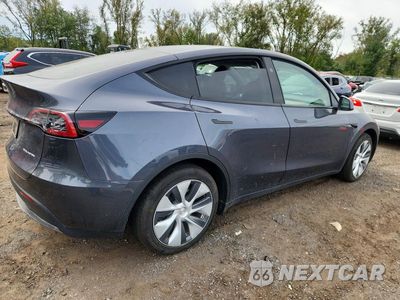Trzecie zdjęcie samochodu z tyłu: 2023 TESLA MODEL Y VIN:7SAYGDEEXPF890905 - miniatura