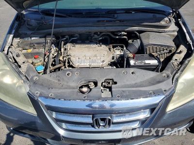 Zdjęcie 11 z 12 samochodu: 2005 HONDA ODYSSEY EXL VIN:5FNRL38705B052562 - miniatura