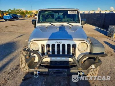 Piąte zdjęcie samochodu w środku: 2012 JEEP WRANGLER UNLIMITED SPORT VIN:1C4HJWDG3CL232296 - miniatura