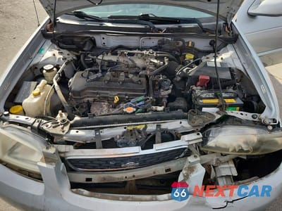 Zdjęcie 11 z 13 samochodu: 2002 NISSAN SENTRA GXE VIN:3N1CB51A52L551142 - miniatura
