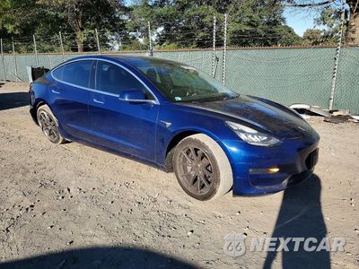 Czwarte zdjęcie samochodu z boku: 2018 TESLA MODEL 3 VIN:5YJ3E1EA4JF154123 - miniatura