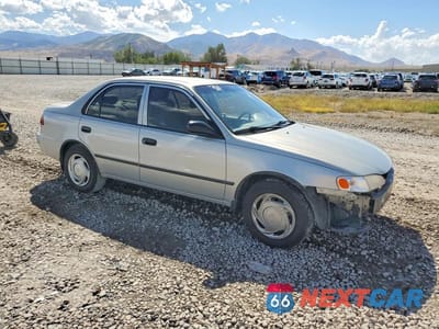 Czwarte zdjęcie samochodu z boku: 1999 TOYOTA COROLLA VE VIN:1NXBR12EXXZ165064 - miniatura