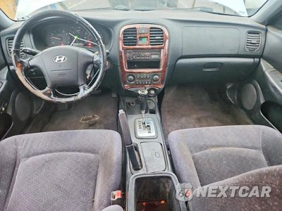 Zdjęcie 8 z 12 samochodu: 2002 HYUNDAI SONATA BASE VIN:KMHWF25S32A681777 - miniatura