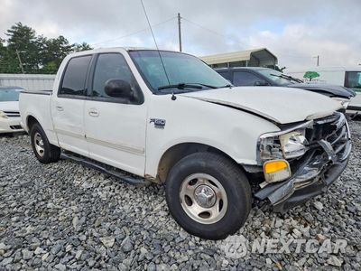 Czwarte zdjęcie samochodu z boku: 2003 FORD F150 SUPERCREW VIN:1FTRW07693KB31596 - miniatura