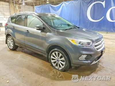 Czwarte zdjęcie samochodu z boku: 2018 FORD ESCAPE TITANIUM VIN:1FMCU9J99JUA79774 - miniatura