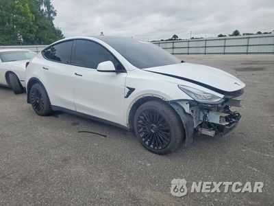 Czwarte zdjęcie samochodu z boku: 2023 TESLA MODEL Y VIN:7SAYGDEE5PF617712 - miniatura