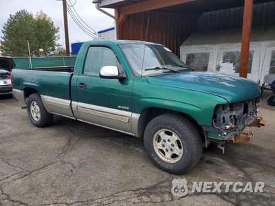 Czwarte zdjęcie samochodu z boku: 1999 CHEVROLET SILVERADO C1500 VIN:1GCEC14T5XE159911 - miniatura