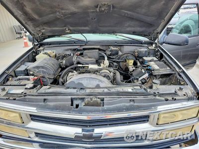 Zdjęcie 12 z 13 samochodu: 1999 CHEVROLET TAHOE K1500 VIN:1GNEK13R3XJ463200 - miniatura