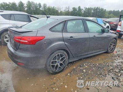 Trzecie zdjęcie samochodu z tyłu: 2015 FORD FOCUS SE VIN:1FADP3F20FL217004 - miniatura
