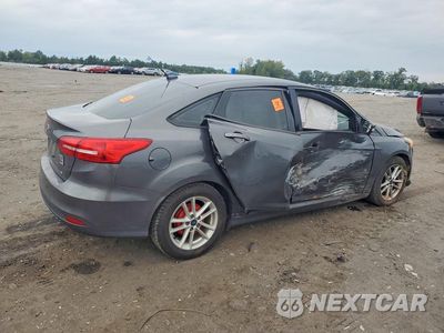 Trzecie zdjęcie samochodu z tyłu: 2017 FORD FOCUS SE VIN:1FADP3F21HL227379 - miniatura