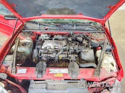 Zdjęcie 11 z 12 samochodu: 1996 CHEVROLET MONTE CARLO LS VIN:2G1WW12M8T9233108 - miniatura