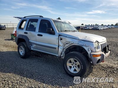 Czwarte zdjęcie samochodu z boku: 2003 JEEP LIBERTY SPORT VIN:1J4GL48K33W537511 - miniatura