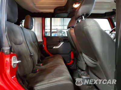 Zdjęcie 10 z 13 samochodu: 2015 JEEP WRANGLER UNLIMITED SAHARA VIN:1C4BJWEG3FL515578 - miniatura