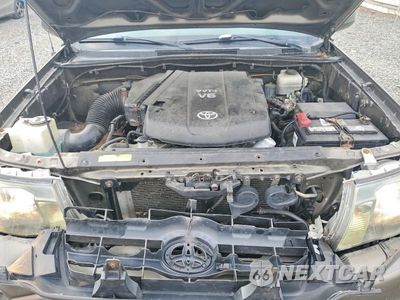 Zdjęcie 12 z 13 samochodu: 2010 TOYOTA TACOMA V6 VIN:3TMLU4EN5AM043261 - miniatura