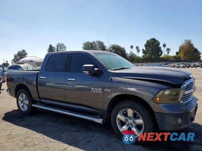Czwarte zdjęcie samochodu z boku: 2015 RAM 1500 SLT VIN:1C6RR7LT2FS778851 - miniatura