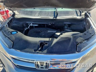 Zdjęcie 12 z 13 samochodu: 2021 HONDA PILOT EXL VIN:5FNYF6H59MB009730 - miniatura
