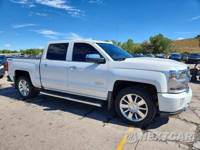 Czwarte zdjęcie samochodu z boku: 2016 CHEVROLET SILVERADO K1500 HIGH COUNTRY VIN:3GCUKTEC7GG255721 - miniatura