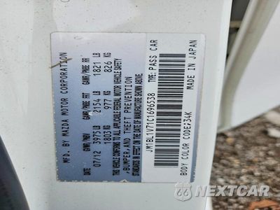 Zdjęcie 12 z 12 samochodu: 2012 MAZDA 3 I VIN:JM1BL1V71C1696538 - miniatura