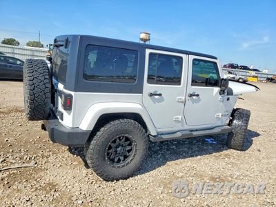 Trzecie zdjęcie samochodu z tyłu: 2016 JEEP WRANGLER UNLIMITED SAHARA VIN:1C4BJWEG6GL221240 - miniatura
